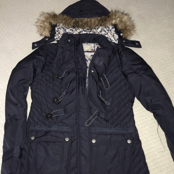 navy blue jacket with fur hood